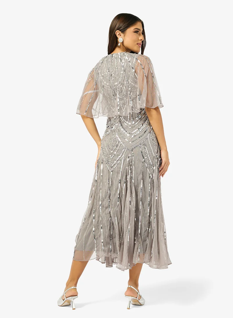 اميليا روز فستان ميدي بياقة دائرية وترتر